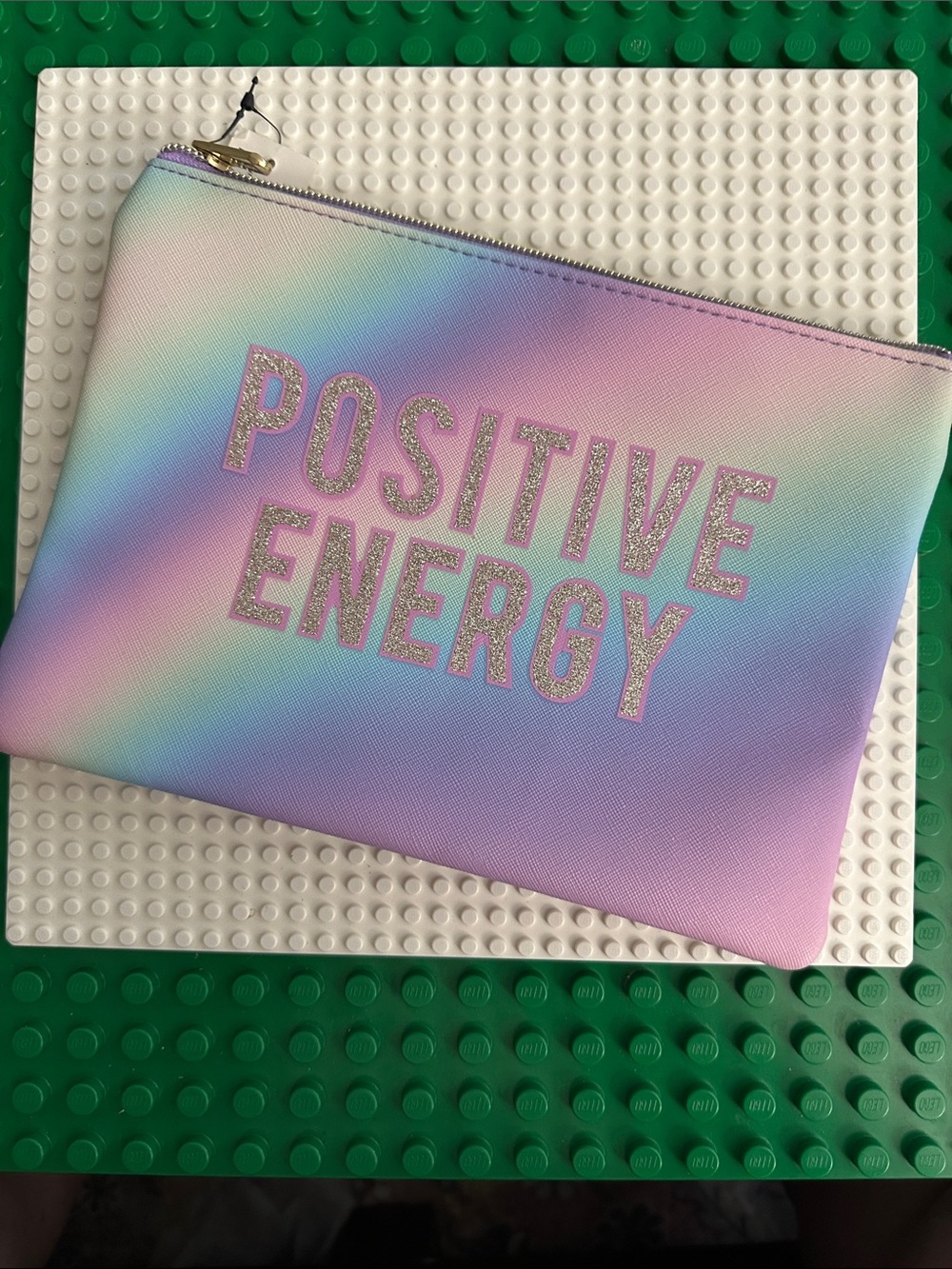 Ruby & Cash Pastel Ombré Zippered Makeup Pouch, has the phrase Positive Energy